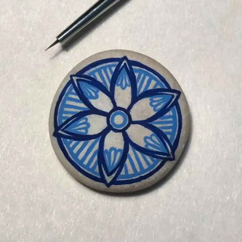 Tiny Painted Flower on Stone image